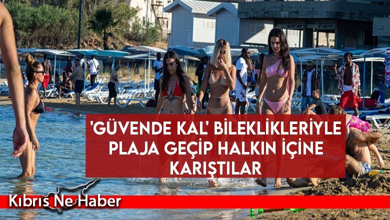 'Güvende Kal' bileklikleriyle plaja geçip halkın içine karıştılar
