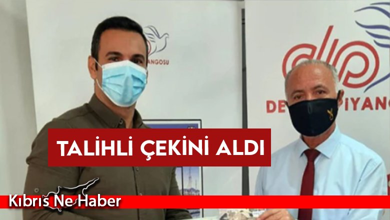 Talihli çekini aldı