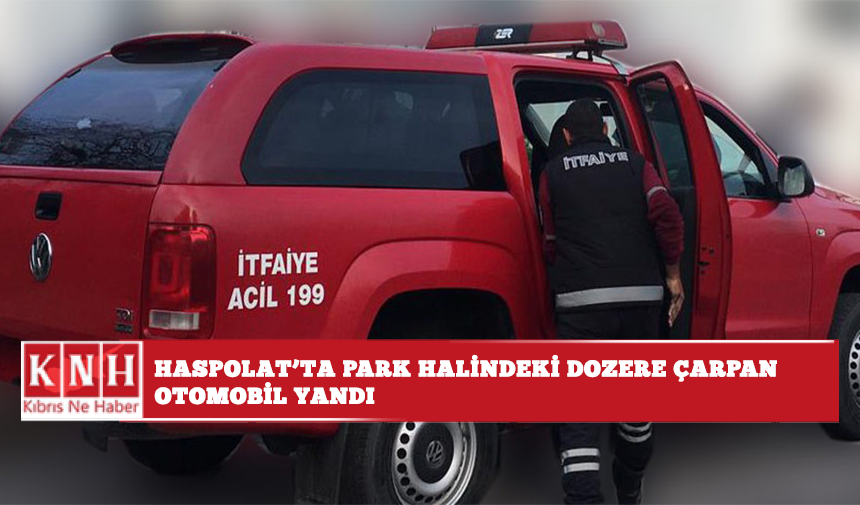 Haspolat’ta park halindeki dozere çarpan otomobil yandı