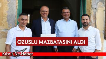 Özuslu mazbatasını aldı