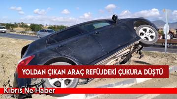 Yoldan çıkan araç refüjdeki çukura düştü