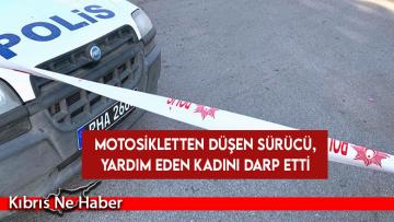Motosikletten düşen sürücü, yardım eden kadını darp etti